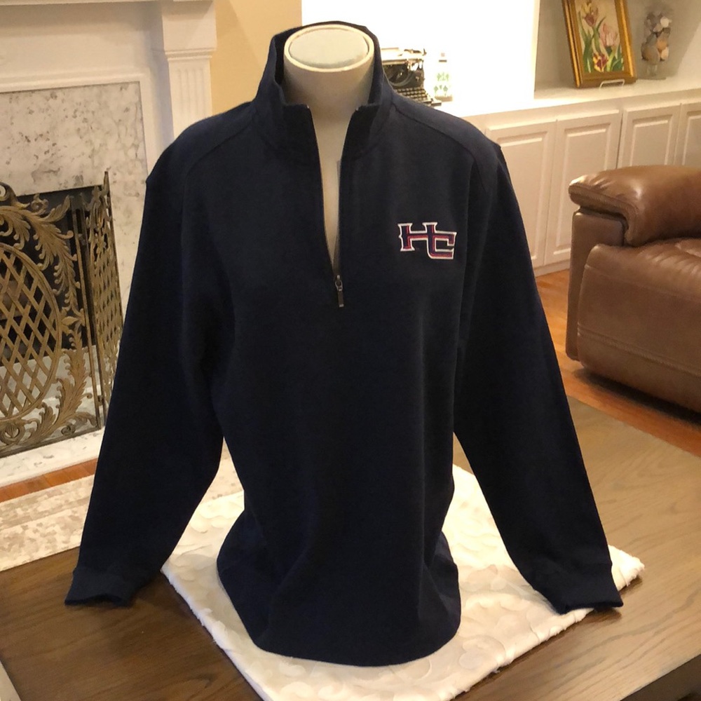 Midweight long sleeve pullover zippered neck. Navy with red and navy lettering.